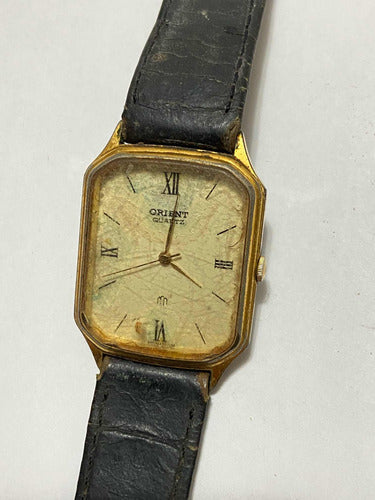 Relógio Antigo Orient Quartz Dourado Zfm-195