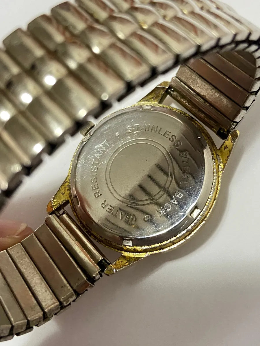 Relógio Antigo Quartz Dourado Pulseira Elastica Water Resist Prateado