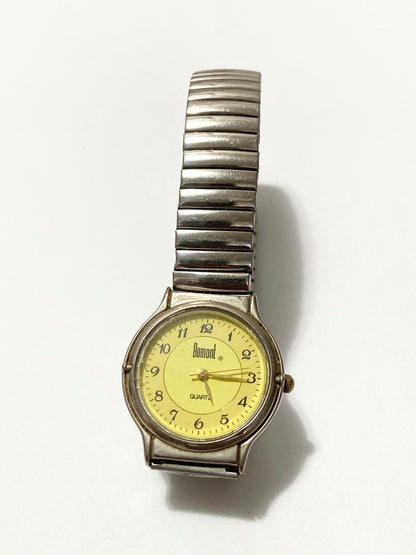 Relógio Antigo Dumont Quartz Pulseira Elastica Prata Dourado Prateado